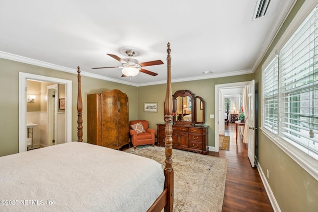 145 River Rd, Orange Park, FL 32073 - bedroom with dark wood-type flooring, ornamental molding, ceiling fan, and baseboards