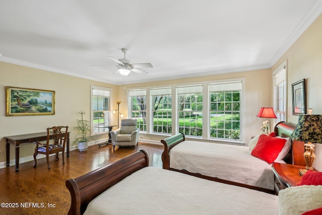 145 River Rd, Orange Park, FL 32073 - bedroom with crown molding, wood finished floors, baseboards, and ceiling fan