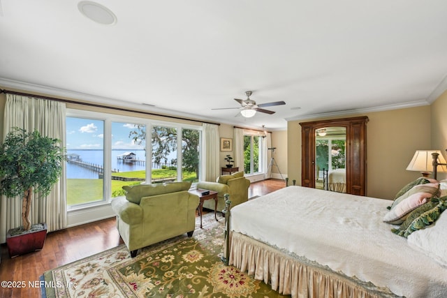 145 River Rd, Orange Park, FL 32073 - bedroom with ornamental molding, a water view, wood finished floors, and a ceiling fan