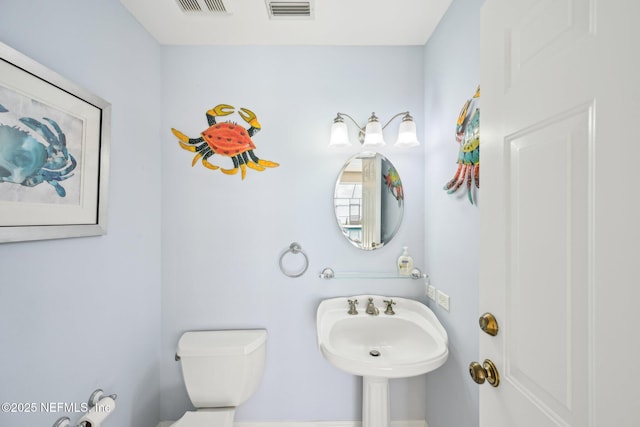 145 River Rd, Orange Park, FL 32073 - half bathroom featuring toilet and a sink