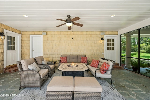 145 River Rd, Orange Park, FL 32073 - living area featuring stone finish floors, a ceiling fan, and recessed lighting