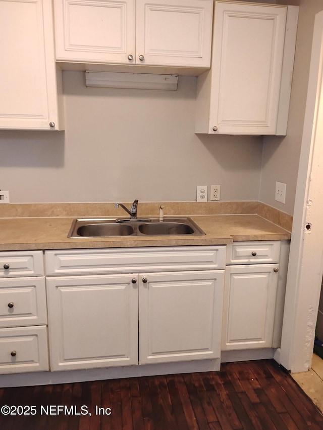 3238 Green St, Jacksonville, FL 32205 - kitchen featuring a sink, white cabinets, and light countertops