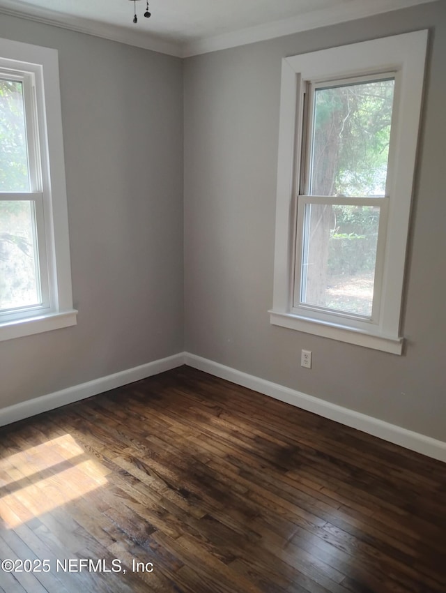 3238 Green St, Jacksonville, FL 32205 - unfurnished room featuring dark wood finished floors, ornamental molding, and baseboards