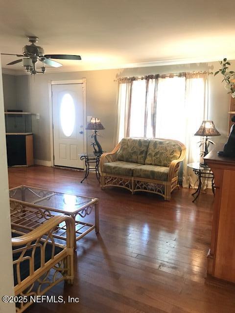 2404 Crill Ave, Palatka, FL 32177 - living room with healthy amount of natural light, wood-type flooring, and ceiling fan