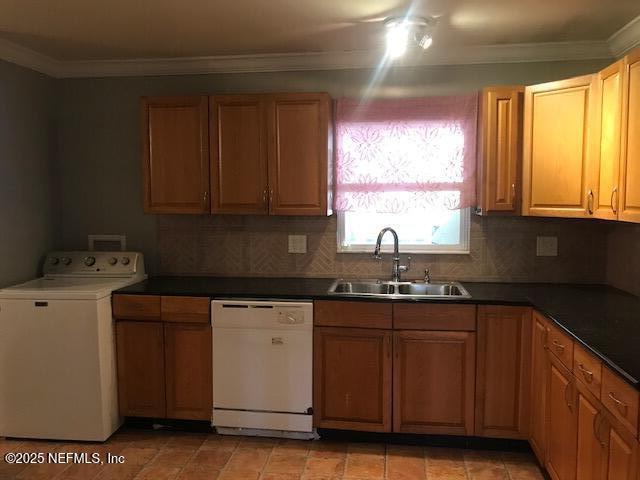 2404 Crill Ave, Palatka, FL 32177 - kitchen featuring dishwasher, washer / clothes dryer, a sink, decorative backsplash, and crown molding