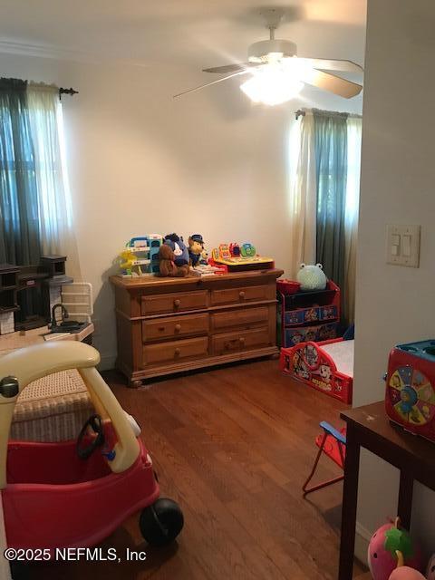 2404 Crill Ave, Palatka, FL 32177 - bedroom featuring wood finished floors and ceiling fan