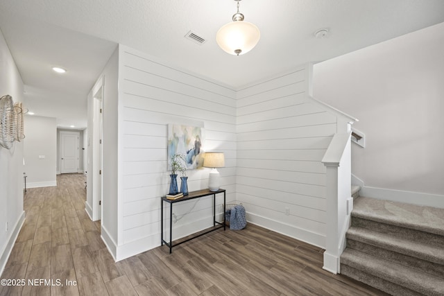 85 Park Center Ave, Ponte Vedra, FL 32081 - hall featuring wood finished floors, baseboards, stairs, recessed lighting, and wooden walls