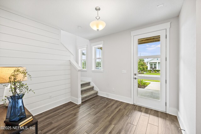 85 Park Center Ave, Ponte Vedra, FL 32081 - entrance foyer with dark wood-style floors, baseboards, and stairs