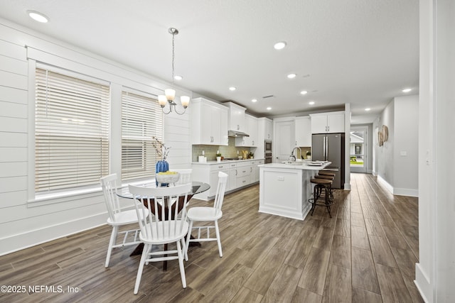 85 Park Center Ave, Ponte Vedra, FL 32081 - dining room featuring wood finished floors, recessed lighting, baseboards, and plenty of natural light