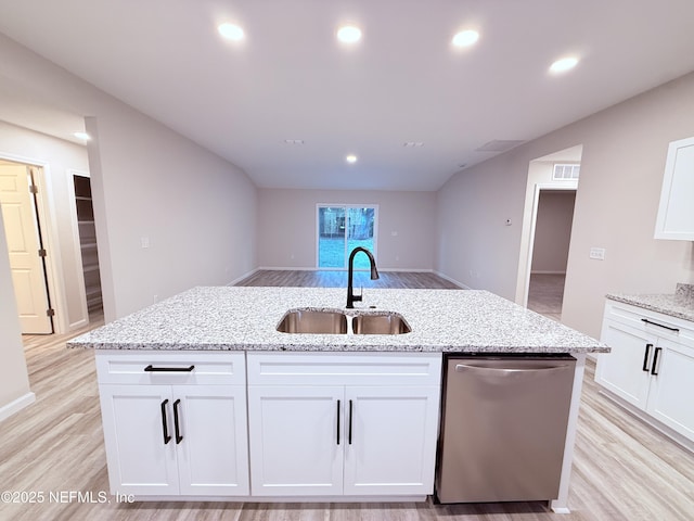 6971 Como Rd, Jacksonville, FL 32210 - kitchen featuring stainless steel dishwasher, a sink, light wood finished floors, white cabinetry, and recessed lighting
