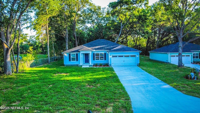 6971 Como Rd, Jacksonville, FL 32210 - view of front of home featuring driveway and a garage