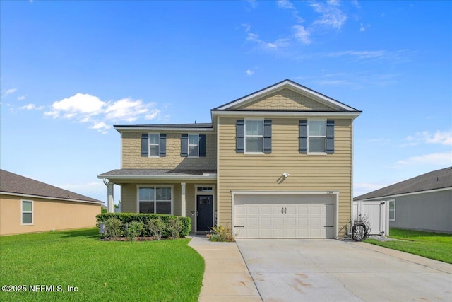 3384 Canyon Falls Dr, Green Cove Springs, FL 32043 - view of front of house with a garage, driveway, and a front yard