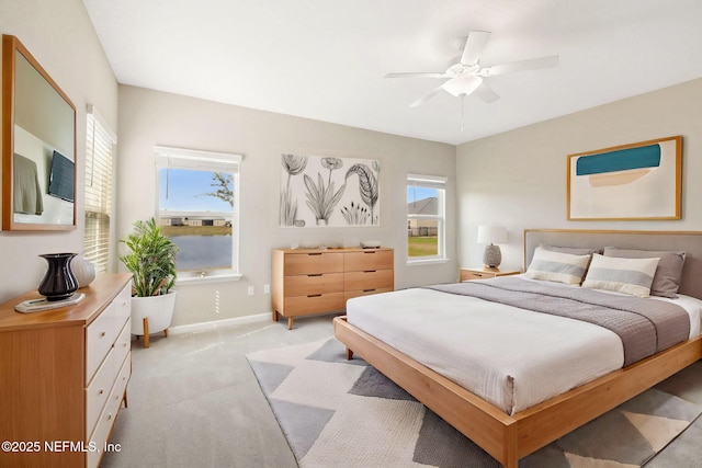 2724 White Cedar Ln, Green Cove Springs, FL 32043 - bedroom featuring light colored carpet, baseboards, and ceiling fan