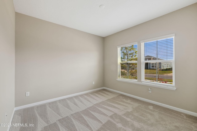 2724 White Cedar Ln, Green Cove Springs, FL 32043 - unfurnished room featuring light carpet and baseboards