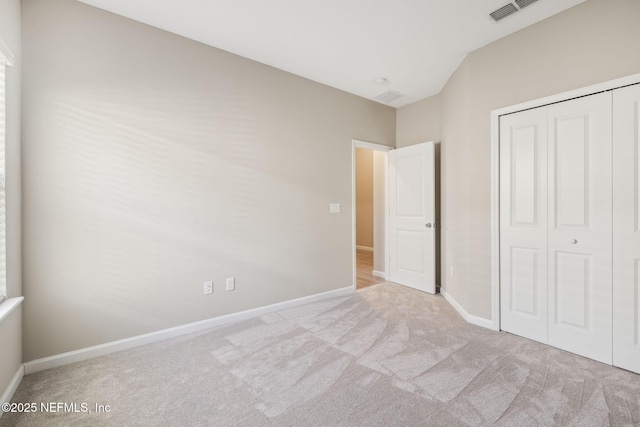 2724 White Cedar Ln, Green Cove Springs, FL 32043 - unfurnished bedroom featuring carpet, a closet, and baseboards