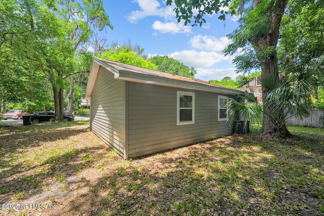 734 N Walnut St, Starke, FL 32091 - view of side of home with central AC unit