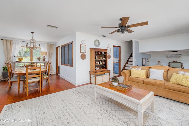 17459 Eagle Bend Blvd, Jacksonville, FL 32226 - living area featuring wood finished floors, a ceiling fan, baseboards, stairway, and crown molding