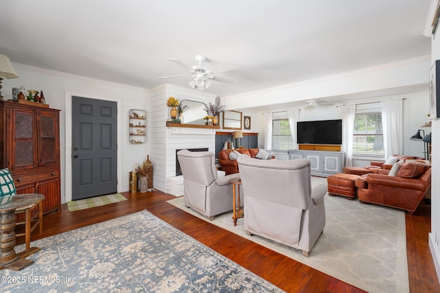 17459 Eagle Bend Blvd, Jacksonville, FL 32226 - living room featuring ceiling fan, a fireplace, crown molding, and wood finished floors