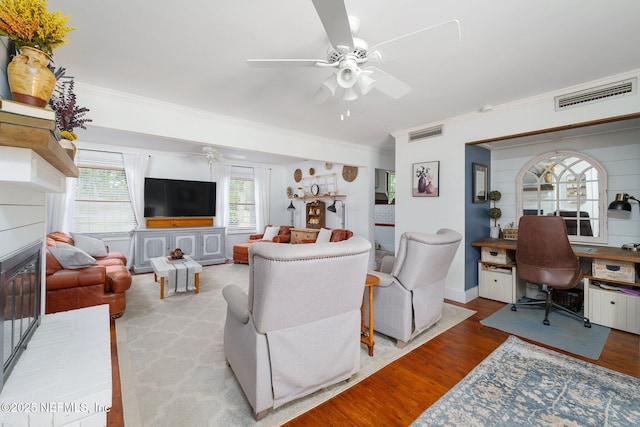 17459 Eagle Bend Blvd, Jacksonville, FL 32226 - living area featuring ceiling fan, crown molding, a desk, wood finished floors, and healthy amount of natural light