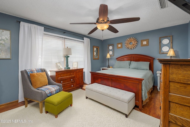 17459 Eagle Bend Blvd, Jacksonville, FL 32226 - bedroom featuring light wood finished floors, a textured ceiling, and ceiling fan