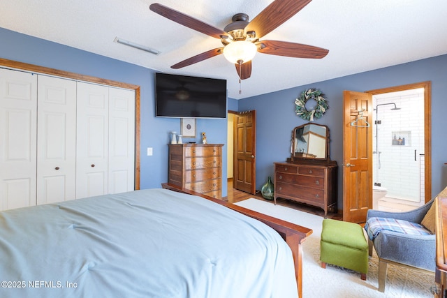 17459 Eagle Bend Blvd, Jacksonville, FL 32226 - carpeted bedroom featuring a closet, a ceiling fan, and ensuite bath