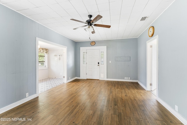 2505 State St, Palatka, FL 32177 - foyer entrance with ceiling fan, hardwood / wood-style floors, and ornamental molding