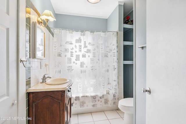2505 State St, Palatka, FL 32177 - full bath with vanity, toilet, and tile patterned flooring