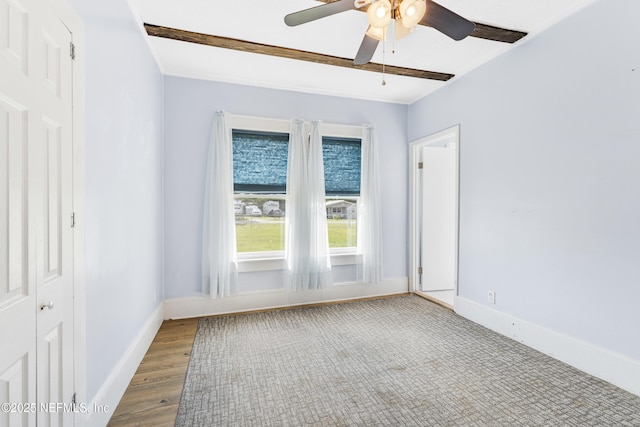 2505 State St, Palatka, FL 32177 - unfurnished room with a ceiling fan, baseboards, and wood finished floors