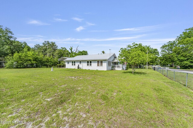 2505 State St, Palatka, FL 32177 - view of yard with a carport