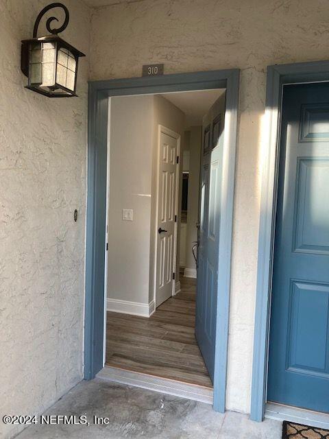 5615 San Juan Ave Unit 310, Jacksonville, FL 32210 - property entrance with stucco siding
