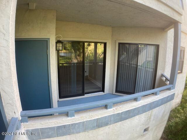 5615 San Juan Ave Unit 310, Jacksonville, FL 32210 - entrance to property featuring stucco siding