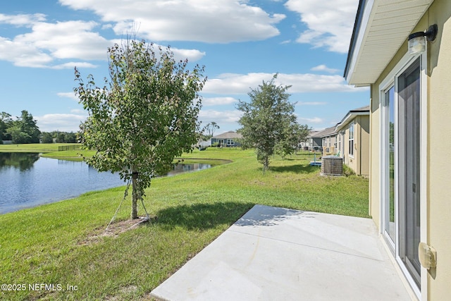 96 Cody St, Saint Augustine, FL 32084 - view of green lawn with a water view and a patio area