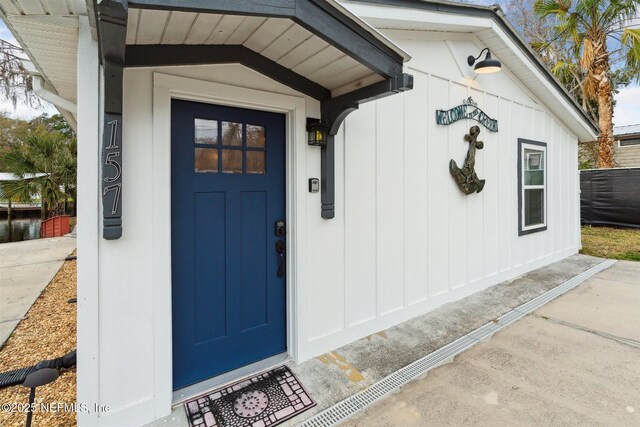 157 Smith Ln, Satsuma, FL 32189 - property entrance featuring board and batten siding