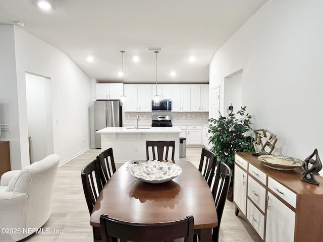 354 Boulder Ln, Saint Johns, FL 32259 - dining area featuring light wood-style flooring and recessed lighting