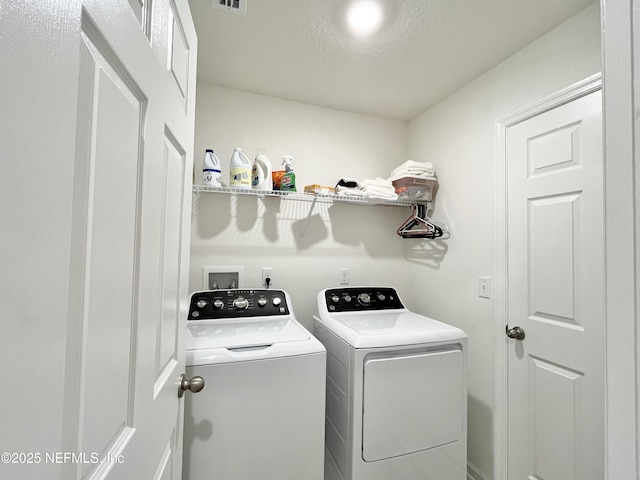 354 Boulder Ln, Saint Johns, FL 32259 - laundry room with washing machine and clothes dryer