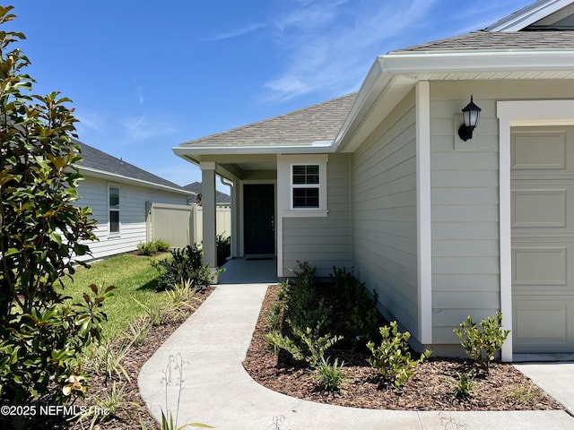 354 Boulder Ln, Saint Johns, FL 32259 - entrance to property featuring a garage and roof with shingles
