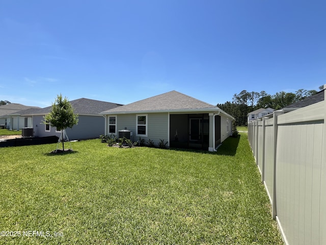 354 Boulder Ln, Saint Johns, FL 32259 - rear view of house with a sunroom, cooling unit, and a shingled roof