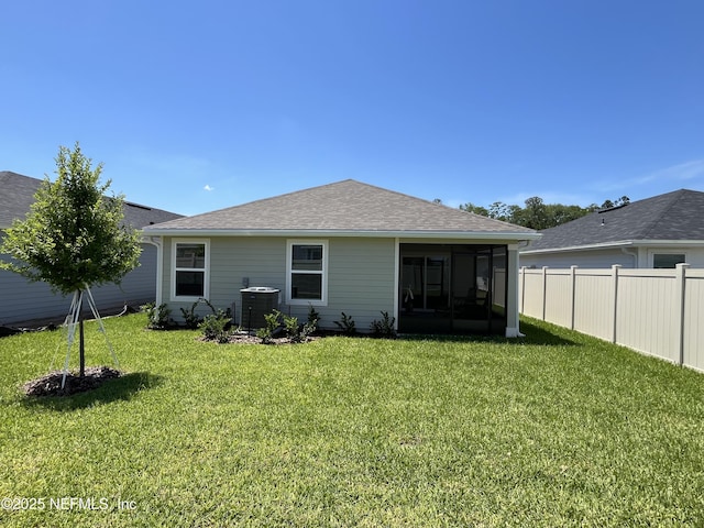 354 Boulder Ln, Saint Johns, FL 32259 - rear view of property featuring a sunroom, roof with shingles, and central AC unit