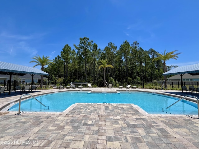 354 Boulder Ln, Saint Johns, FL 32259 - community pool featuring a patio area