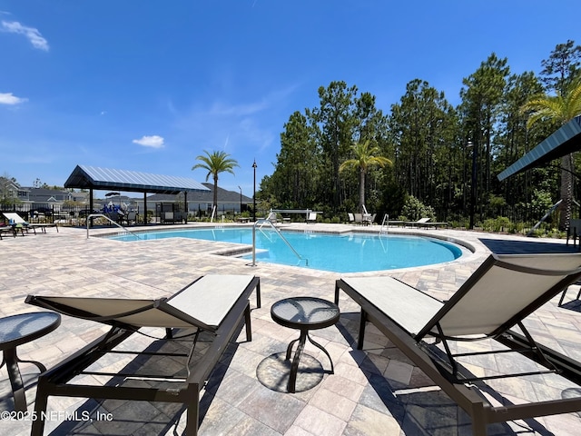354 Boulder Ln, Saint Johns, FL 32259 - community pool featuring a patio