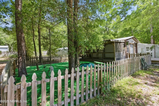 2708 Poinsettia Ave, Middleburg, FL 32068 - fenced yard featuring a sunroom