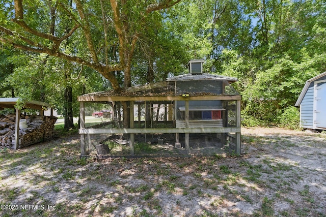 2708 Poinsettia Ave, Middleburg, FL 32068 - rear view of house featuring an outbuilding and exterior structure