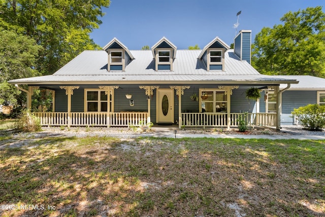 2708 Poinsettia Ave, Middleburg, FL 32068 - view of front of house featuring a porch and a chimney