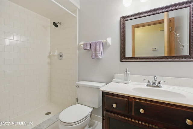 2708 Poinsettia Ave, Middleburg, FL 32068 - bathroom with toilet, vanity, and tiled shower