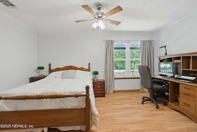 2708 Poinsettia Ave, Middleburg, FL 32068 - bedroom featuring light wood-type flooring, crown molding, an office area, baseboards, and ceiling fan