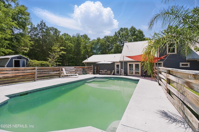 2708 Poinsettia Ave, Middleburg, FL 32068 - view of pool featuring french doors and a patio area