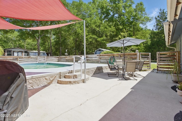 2708 Poinsettia Ave, Middleburg, FL 32068 - view of pool with a patio, outdoor dining area, and view of scattered trees