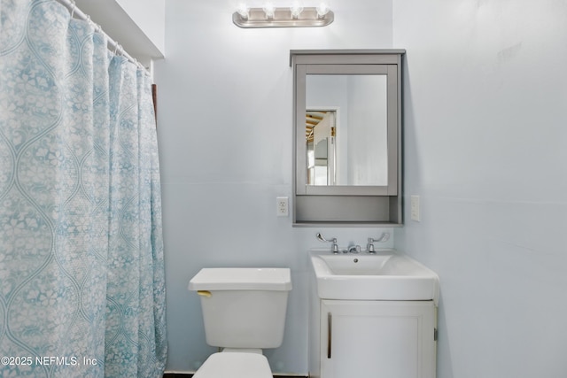 2708 Poinsettia Ave, Middleburg, FL 32068 - bathroom featuring vanity, toilet, and a shower with shower curtain