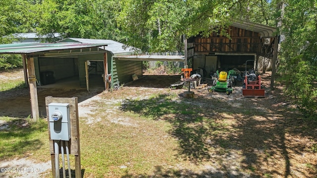 2708 Poinsettia Ave, Middleburg, FL 32068 - view of yard with an outdoor structure and an outbuilding