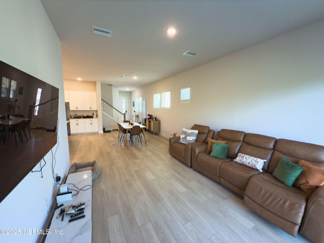 10065 Element Rd, Jacksonville, FL 32256 - living area with light wood-style floors, recessed lighting, and baseboards
